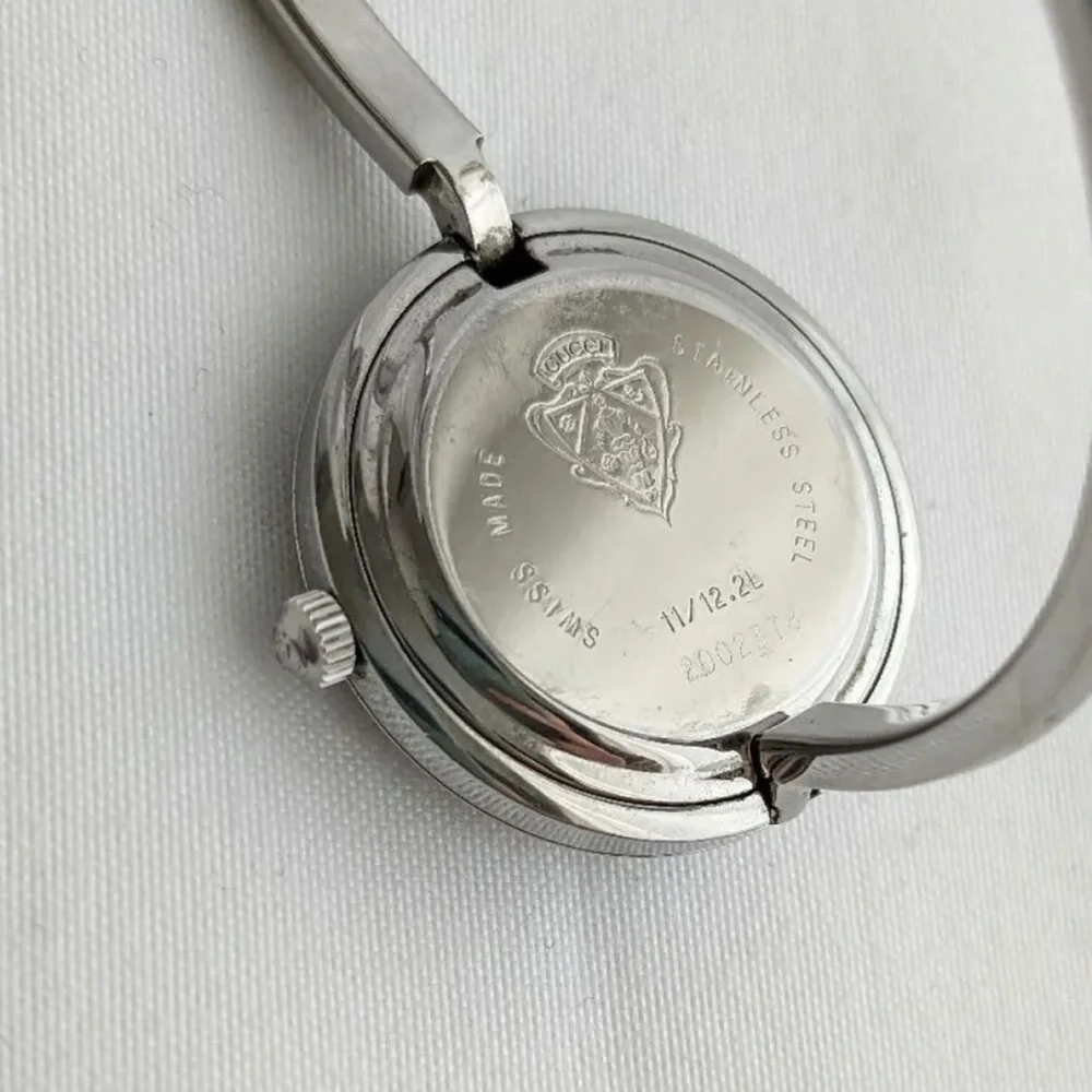 GUCCI Silver Italian Luxury Bracelet Watch with Bezels for changing